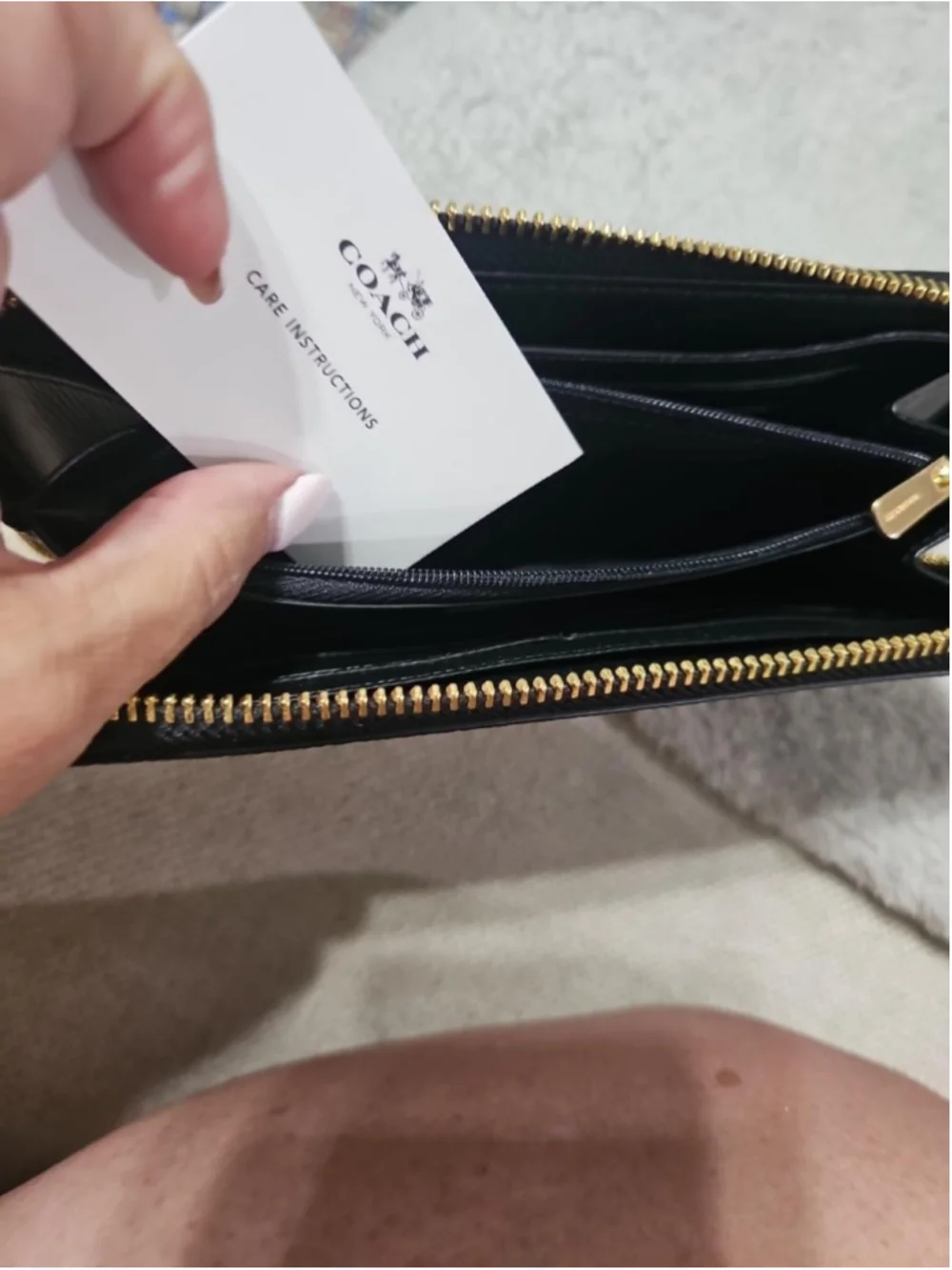 Coach this zip